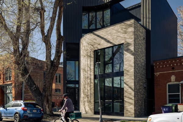 contemporary home in Denver combines brick and metal siding ONE Residential Builders