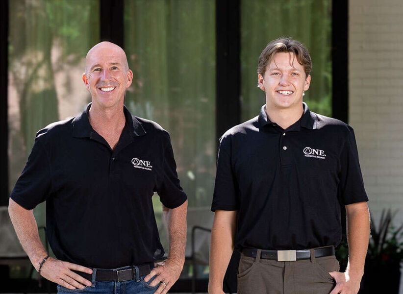 hero image of two partners at ONE Residential Builders Denver