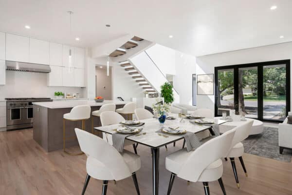 modern home open concept of kitchen, dining room, and sitting area with view of outdoors ONE Residential Builders Denver