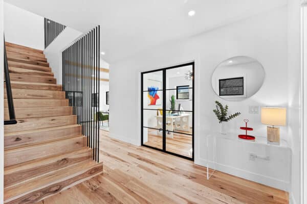 modern home with new wood flooring, bright walls, and office space ONE Residential Builders Denver